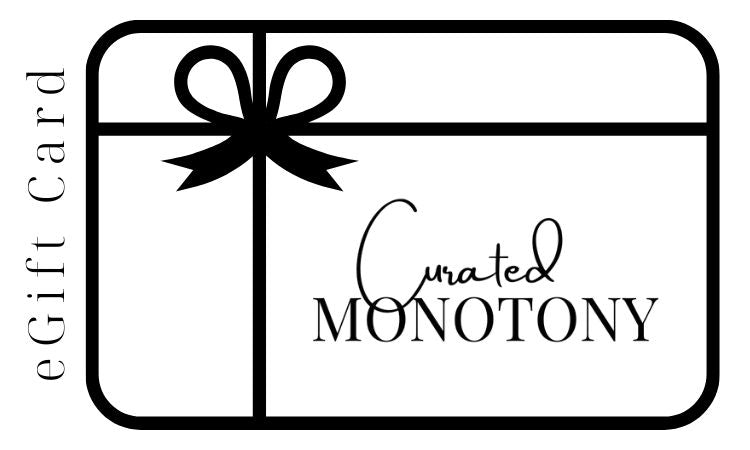Curated Monotony Gift Card